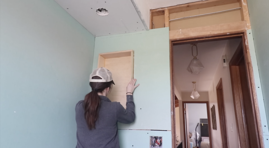 inserting the recessed cabinet 